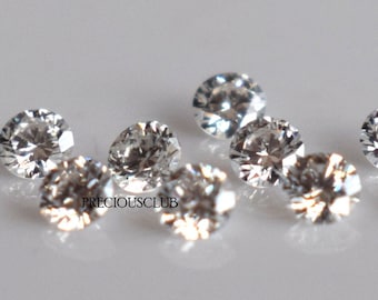 Diamante redondo blanco natural de color E-F de talla brillante frente a diamante suelto de color E-F de 2,75 mm