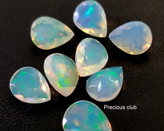 Naturalny fasetowany opal etiopski w kształcie gruszki 5 x 7 mm, jakość AAA, najlepszy ognisty blask etiopskiego opalu