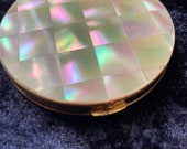 Vintage gold tone mother of pearl powder compact