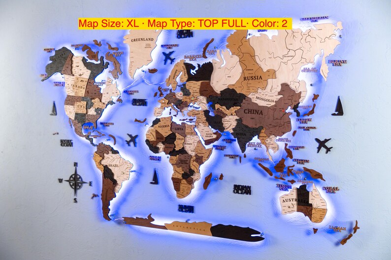 A world map with illuminated regions, likely representing different countries and their borders, and various landmarks and symbols.