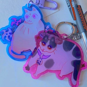 Dreamcore cats psychic AND detective cat?!?! Abt 3 inch acrylic charms translucent jelly background