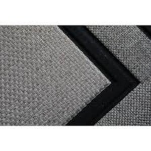 May include: A gray woven rug with a black border. The rug has a textured surface and a subtle pattern.