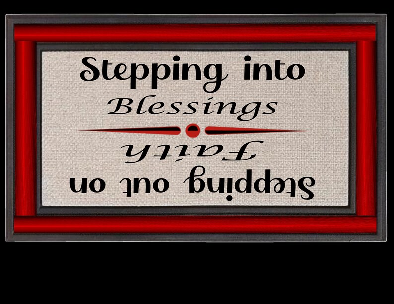 May include: A framed sign with a red and black border. The sign has a beige background with the text "Stepping into Blessings with Faith" written in black cursive.