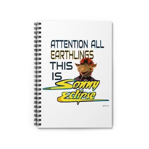 May include: A white spiral notebook with a colorful illustration of a character from the movie "Labyrinth". The text "ATTENTION ALL EARTHLINGS THIS IS Sonny Eclipse" is printed on the notebook.