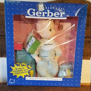 Vintage 1991 Gerber Baby Doll - 11 inch - Drink & Wet Changing Set; 8 piece Feeding Set; Gerber Products Company; Like New; NRFB