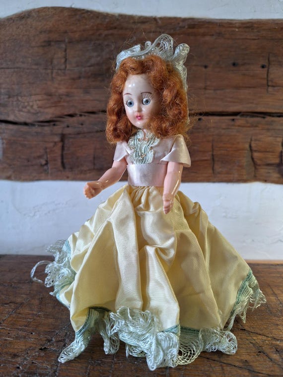 Vintage 7-1/2 Inch Hard Plastic Doll With Strawberry Blonde Hair