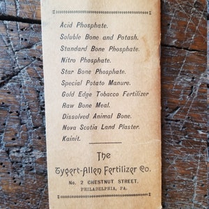May include: A vintage advertisement for Tygert-Allen Fertilizer Co. located at 2 Chestnut Street, Philadelphia, PA. The ad lists various types of fertilizer products, including Acid Phosphate, Soluble Bone and Potash, Standard Bone Phosphate, Nitro Phosphate, Star Bone Phosphate, Special Potato Manure, Gold Edge Tobacco Fertilizer, Raw Bone Meal, Dissolved Animal Bone, Nova Scotia Land Plaster, and Kainit.