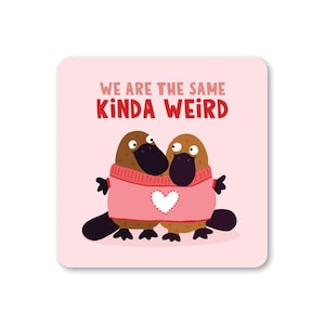 May include: A set of three ceramic mugs with a speckled, matte finish. The mugs are in shades of cream, light gray, and dark gray. Each mug has a simple, modern design and a rounded handle. Perfect for coffee or tea.