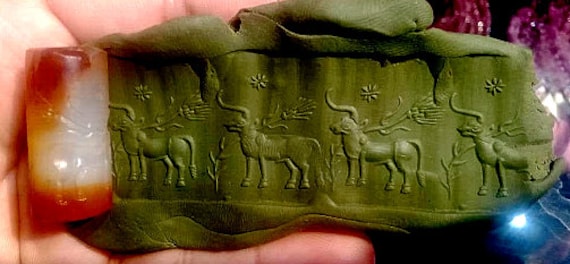 Ancient Mesopotamia intaglio orange agate roll bea
