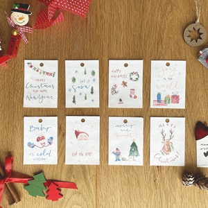 Set 8 biglietti d'auguri natalizi, disegno in acquerello e calligrafia