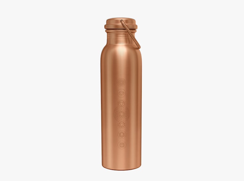 May include: A copper water bottle with a carrying handle. The bottle has a brushed finish and a design of circles on the side.