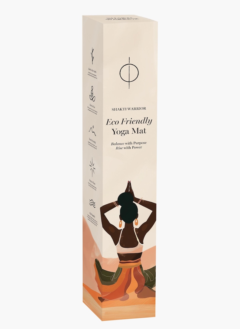 May include: A brown and beige box with a woman in a yoga pose on the front. The box says "Shakti Warrior Eco Friendly Yoga Mat Balance with Purpose Rise with Power".