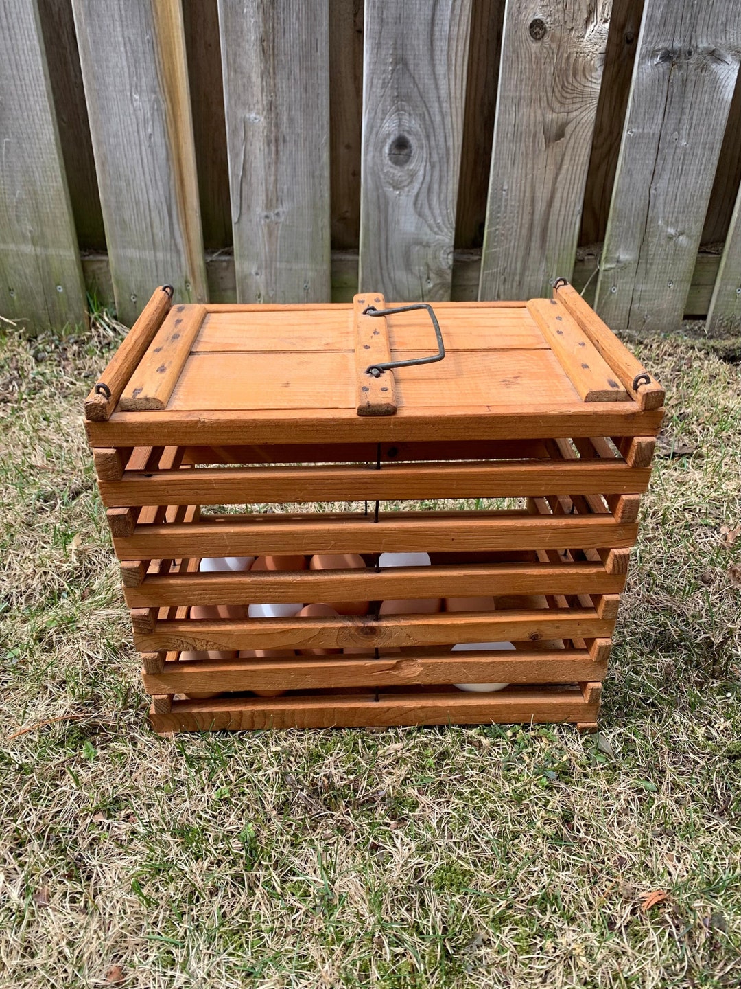 Antique wooden egg crate wood slatted box with slide lid metal