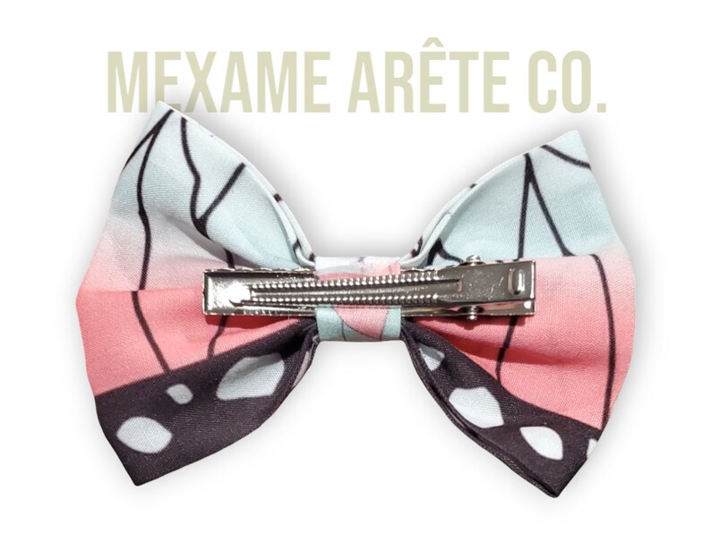 Picture showing the back with the crocodile clip we use for the bow to stay in its place