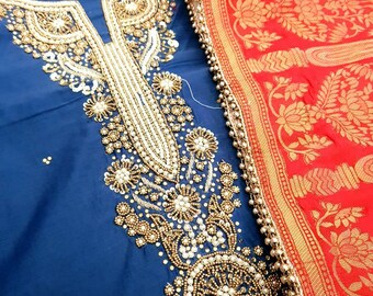May include: A blue fabric with a gold and white beaded design. The fabric is paired with a red fabric with a gold floral pattern.