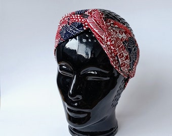 Bandana hairband with aluminum wire, sustainably handmade from 2nd hand batik fabric: Dark red with dark blue and white patterns.