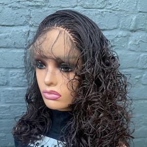 May include: A dark brown wig with micro braids and curly ends is displayed on a mannequin head. The wig features a lace front and is styled with a side part. The mannequin is wearing a black shirt with white text that reads "Beauty".
