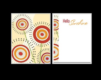 May include: Greeting card set featuring a floral design with red, orange, and yellow circular shapes on a cream background. The right card has the text "Hello Sunshine" in orange script.