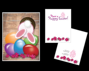 May include: A colorful Easter card with a bunny peeking out from behind a pile of colorful eggs. The card has a wooden background and the text "Have a Happy Easter!" on the front.