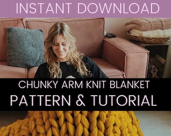 May include: A close-up of a chunky knit blanket in a mustard yellow color. The blanket is made with thick yarn and has a large stitch pattern. The blanket is folded in half and is sitting on a light brown surface. The text "Wools by Nicky" is visible in the lower right corner of the image.