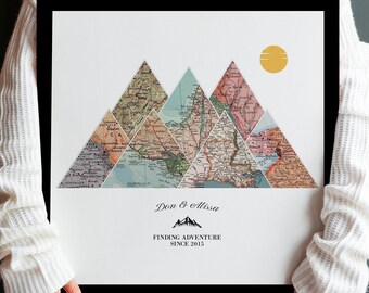 May include: A vintage map print with a mountain range design. The map is made up of different sections of a vintage map, with the mountains formed by the map's borders. The print features a yellow sun and the text "Don & Alissa Finding Adventure Since 2015".