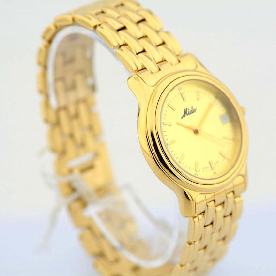 Reloj mido ocean star dorado sale