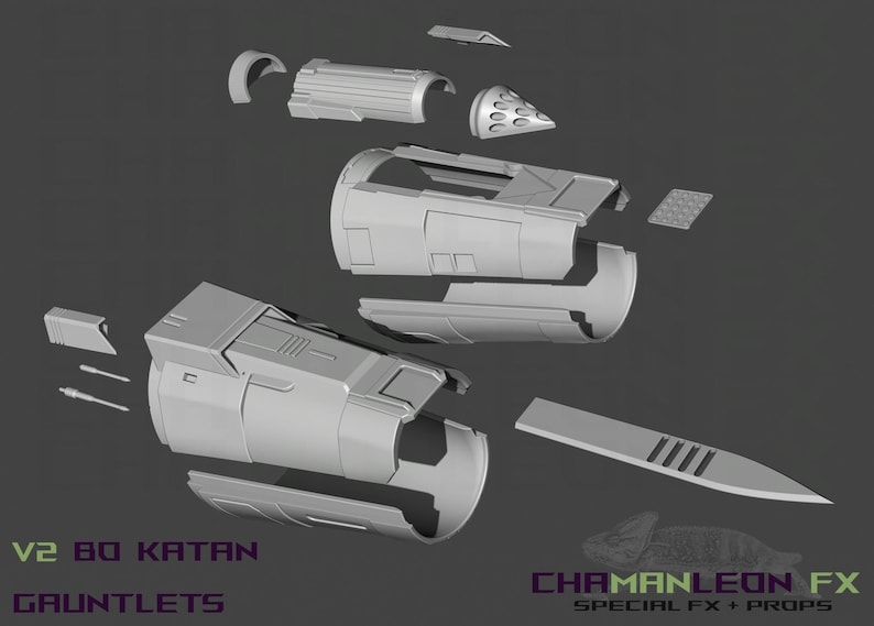 May include: A set of 3D printed parts for a Bo Katan gauntlets prop. The parts are made of gray plastic and are arranged on a gray background. The text "V2 BO KATAN GAUNTLETS" is visible at the bottom of the image.