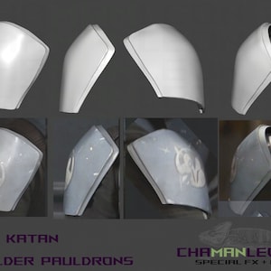 May include: A set of 3D printed shoulder pauldrons for cosplay or prop making. The pauldrons are white and have a smooth, rounded surface. The image also shows the pauldrons with a weathered, gray paint finish and a white symbol.
