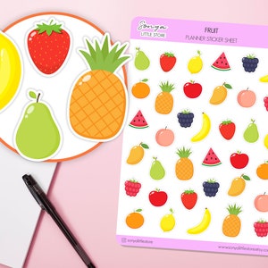 May include: A sheet of fruit planner stickers with a variety of fruits including bananas, strawberries, pineapples, pears, lemons, watermelons, blackberries, peaches, raspberries, apples, oranges, and mangos. The sticker sheet is white with a pink border and the text "FRUIT PLANNER STICKER SHEET" in black.