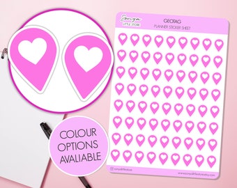 May include: A sheet of pink planner stickers with a white heart inside each location pin. The sheet says "Geotag Planner Sticker Sheet" at the top. Two individual stickers are shown in the top left corner.
