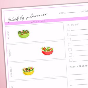 May include: A weekly planner with a pink header and a section for a to-do list and habit tracker. The planner features illustrations of salad bowls for each day of the week. The text "Weekly planner" is written in cursive.