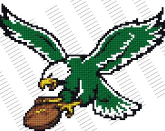 May include: A pixelated image of a green eagle in flight, clutching a brown football. The eagle has white and black accents, with a yellow beak and talons. The design is a stylized representation of a sports team logo.