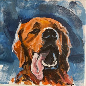 以下が含まれることがあります： オレンジ、茶色、白の色合いで描かれた犬の顔のオリジナルペイント。背景は青色。犬の舌はピンク色です。作品は右下に署名されています。