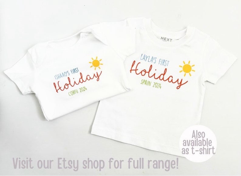 May include: Two white short-sleeved shirts with graphic prints. One features the text "ISHAQ'S FIRST Holiday" in blue and red with "CORFU 2024" in green and a yellow sun. The other says "Layla's FIRST Holiday" in blue and red with "SPAIN 2024" in green.