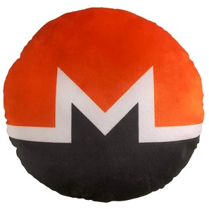 May include: A round, orange, black, and white throw pillow with the letter "M" in the center. The pillow is made of soft, plush fabric.