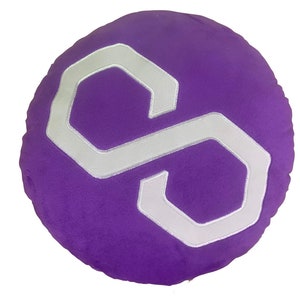 May include: Purple round pillow with a white embroidered infinity symbol.