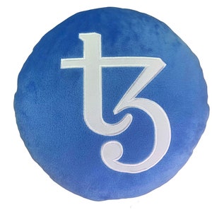 May include: A round blue plush pillow with a white embroidered "t3" logo.