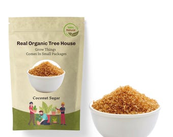May include: A brown paper bag with a white label that reads "Real Organic Tree House Grow Things Comes In Small Packages" and "Coconut Sugar". The bag has a green 100% Natural logo. A white bowl filled with brown coconut sugar is in the foreground.