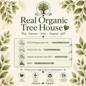 May include: A cream-colored informational sign featuring the text Real Organic Tree House, Natural, Pure, Organic, and Thank you for supporting our small business. It includes registration numbers for GSTIN, FSSAI, IEC, and BRN, framed by green leaves.