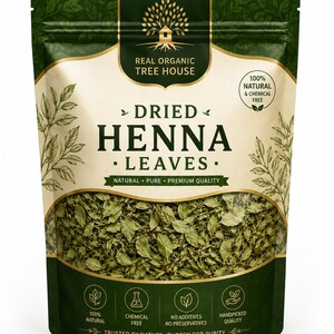 May include: A stand-up pouch containing dried henna leaves with a dark green and cream color scheme. The label features the text Real Organic Tree House, Dried Henna Leaves, 100% Natural & Chemical Free, and lists features like no additives.