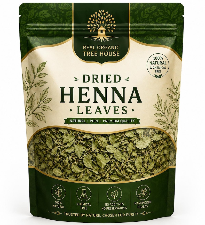 May include: A stand-up pouch containing dried henna leaves with a dark green and cream color scheme. The label features the text Real Organic Tree House, Dried Henna Leaves, 100% Natural & Chemical Free, and lists features like no additives.