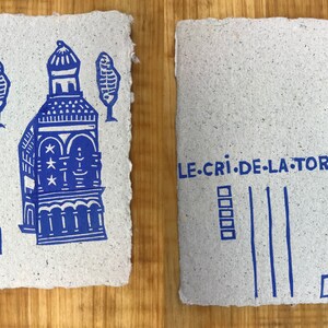 Les cartes postales des cités bleues / Linogravures Forteresse/fontaine