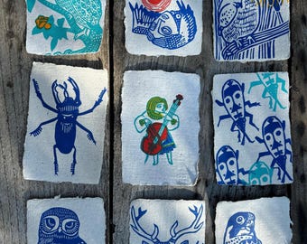 The winged postcards of the Cry of the Turtle / Linocuts