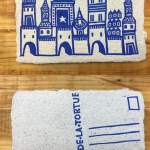 Les cartes postales des cités bleues / Linogravures Cité bleue