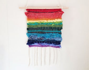 Small rainbow woven wall hanging