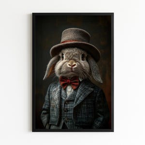 May include: A framed portrait of a rabbit dressed in a gray plaid suit, a red bow tie, and a gray top hat with a brown band. The rabbit has long ears and a serious expression. The background is a dark, textured brown.