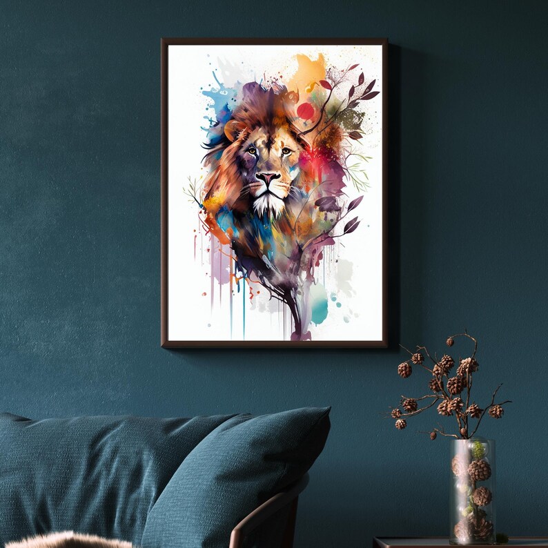 May include: A watercolor painting of a lion's head with colorful splashes of paint and leaves. The lion's mane is a mix of brown, orange, and yellow, and its eyes are a deep brown. The background is white.