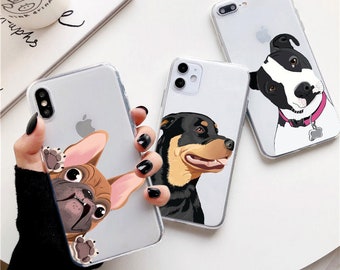Op de afbeelding: Transparante telefoonhoesjes met hondenillustraties. Eén hoesje heeft een Franse Bulldog, een ander een Rottweiler en de derde een Pitbull. Elke hoes heeft een ander hondenrasontwerp, met de gezichten van de honden.