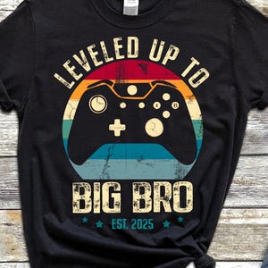 Leveled Up to Big Bro T-Shirt, Funny Sibling Announcement Shirt, Gamer Big Brother Tee, Pregnancy Reveal Shirt, Hoodie, Sweatshirt Est 2025