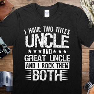 May include: Black t-shirt with white text that reads "I have two titles Uncle and Great Uncle and I rock them both".